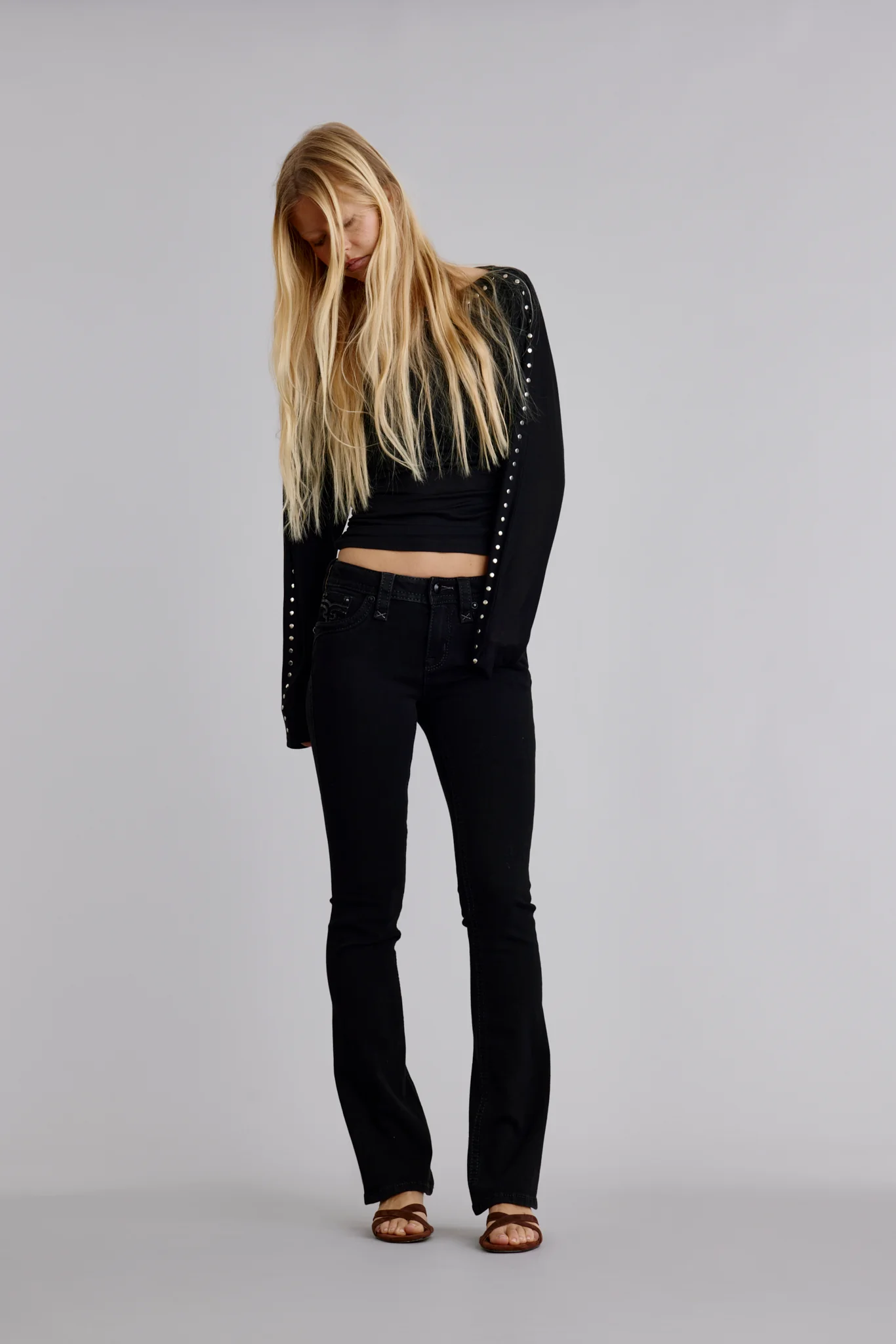Celine Mid-Rise Bootcut Black Jeans - Image 5