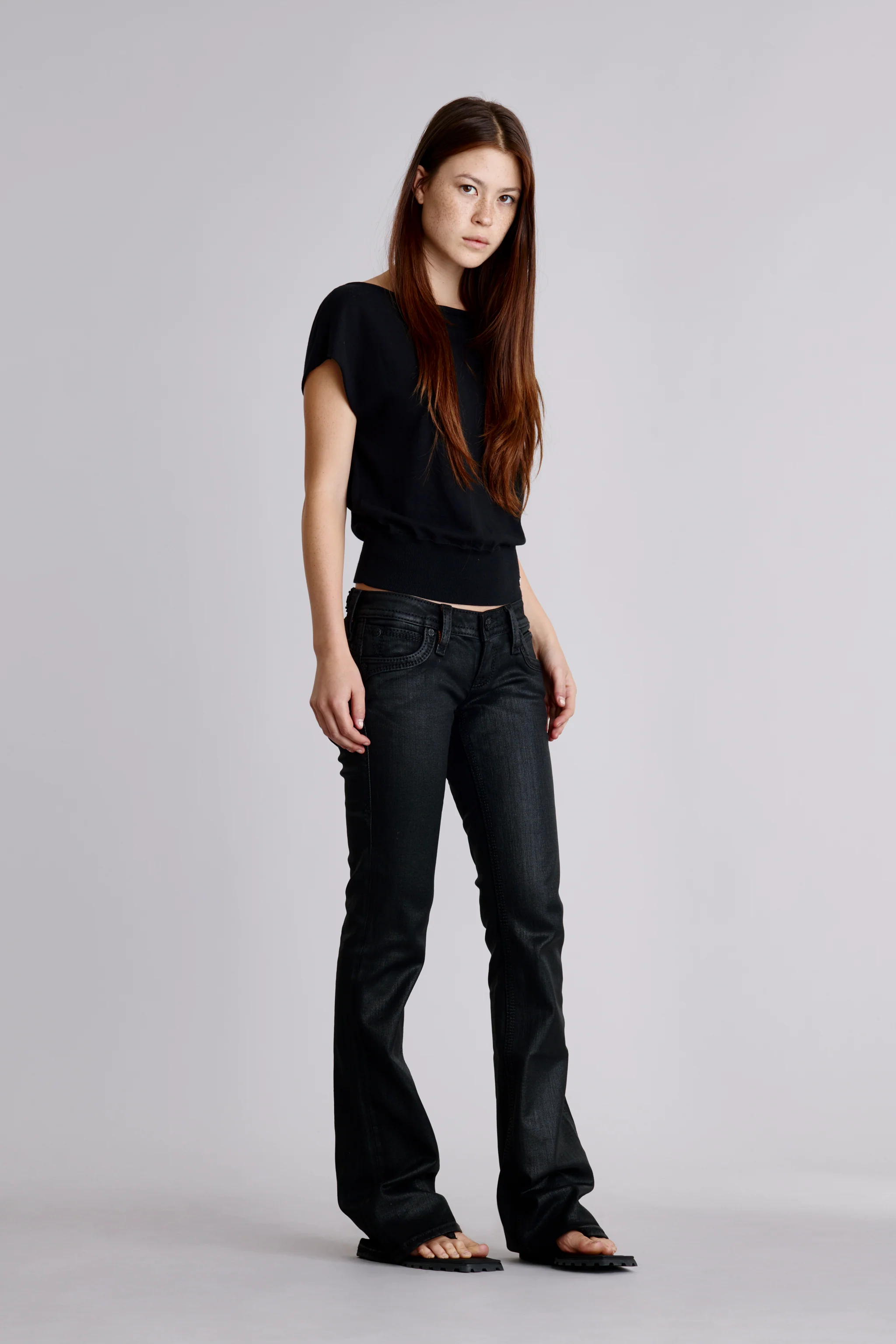 Gwen Black Super Low-Rise Bootcut Jeans in Black Coating - Image 3