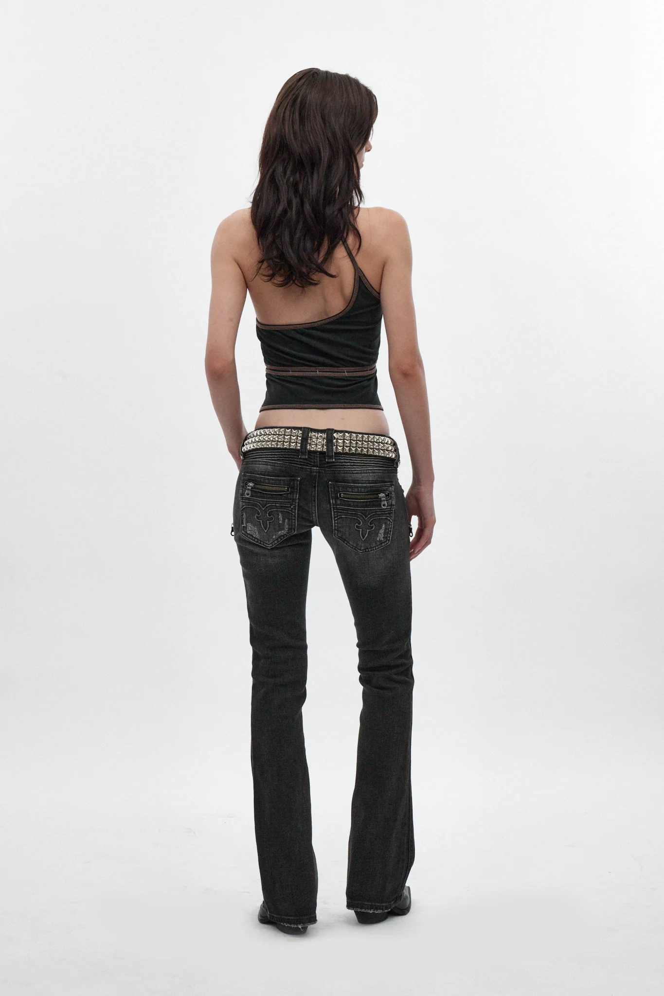 Kamil Super Low-Rise Bootcut Jeans in Faded Black - Image 4